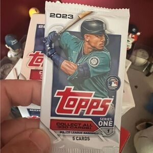 Topps Series One Baseball Card Pack with Teal and Blue. 50 packs for $50.00.